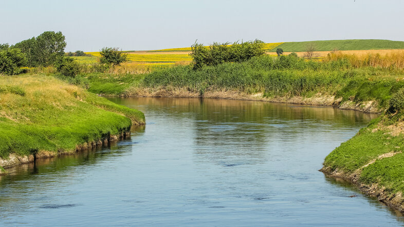 An image of the Ergene River in Turkey, fields to left and right