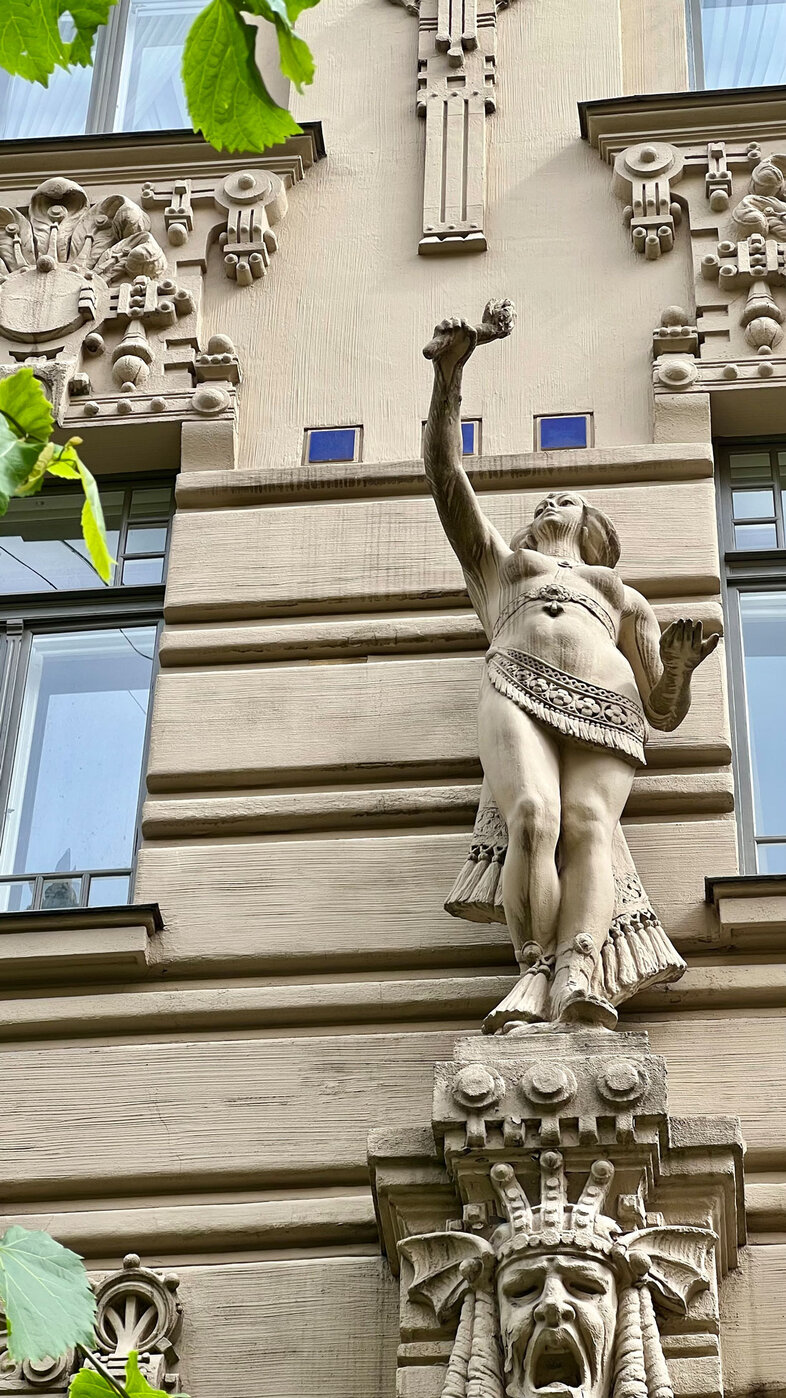 Facade detail on Albert Street showing a female sculpture and other details