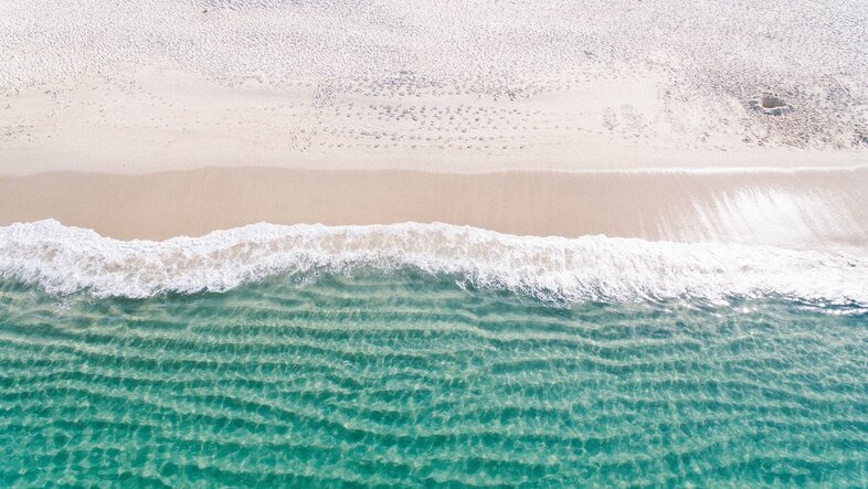 Seawater and a beach seen from above