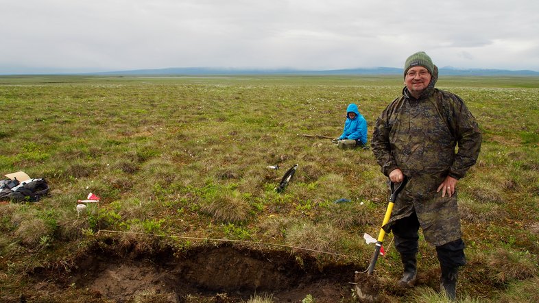 Andreas Richter in the field, taking soil samples