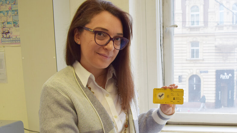 Laura Maggini showing the prototype tickets