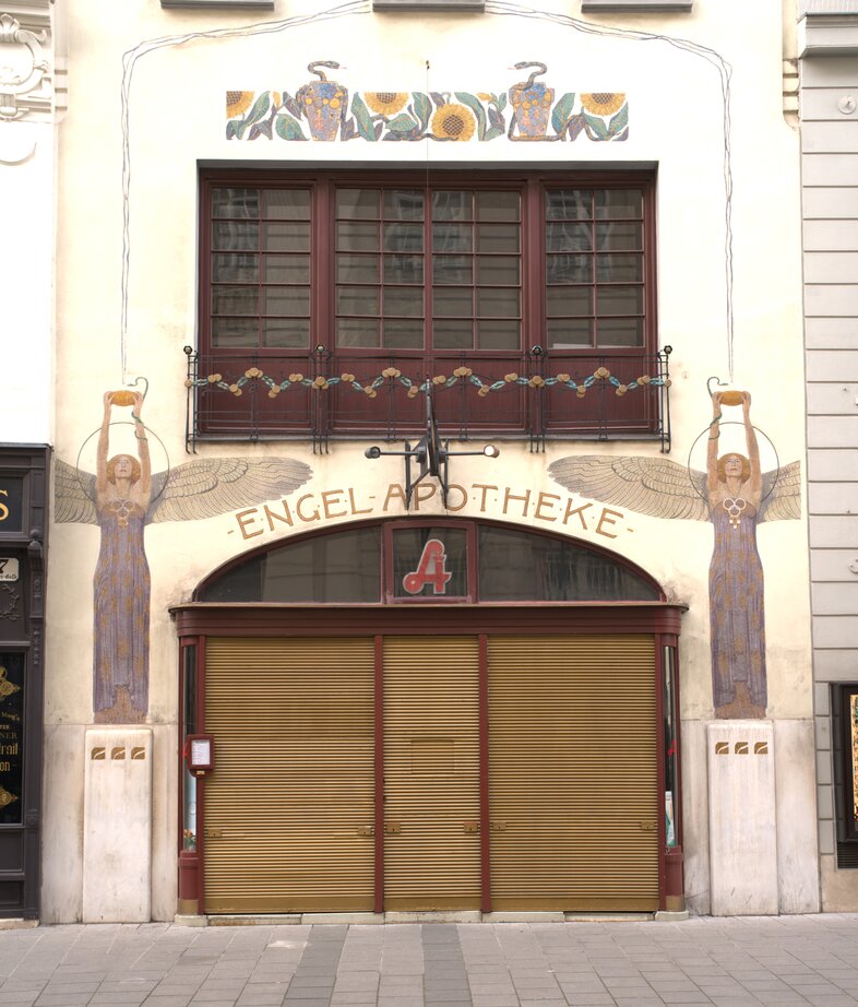 photo of a closed pharmacy in Vienna with art deco facade